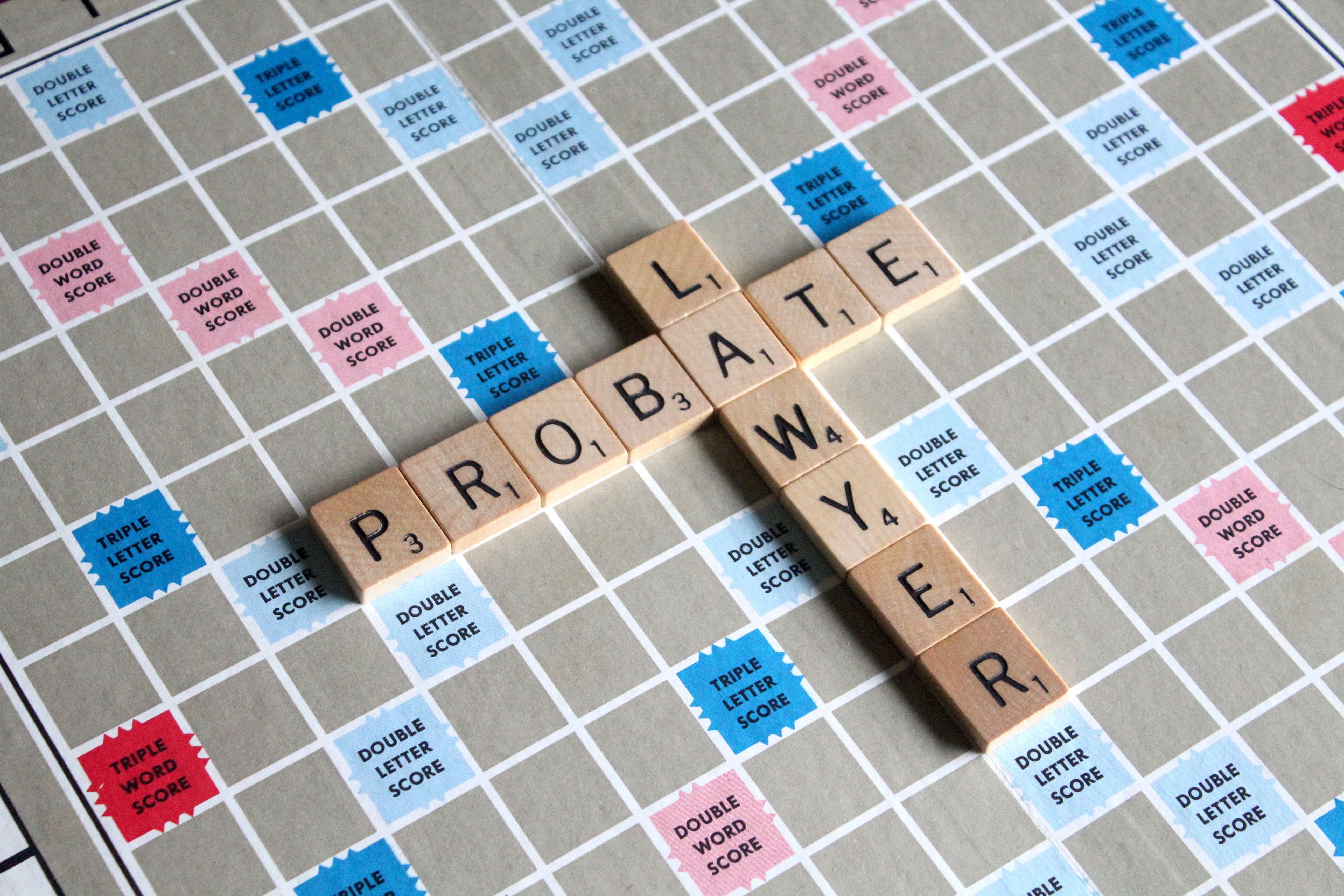 Scrabble game with lawyer and probate words; image by Melinda Gimpel, via Unsplash.com.