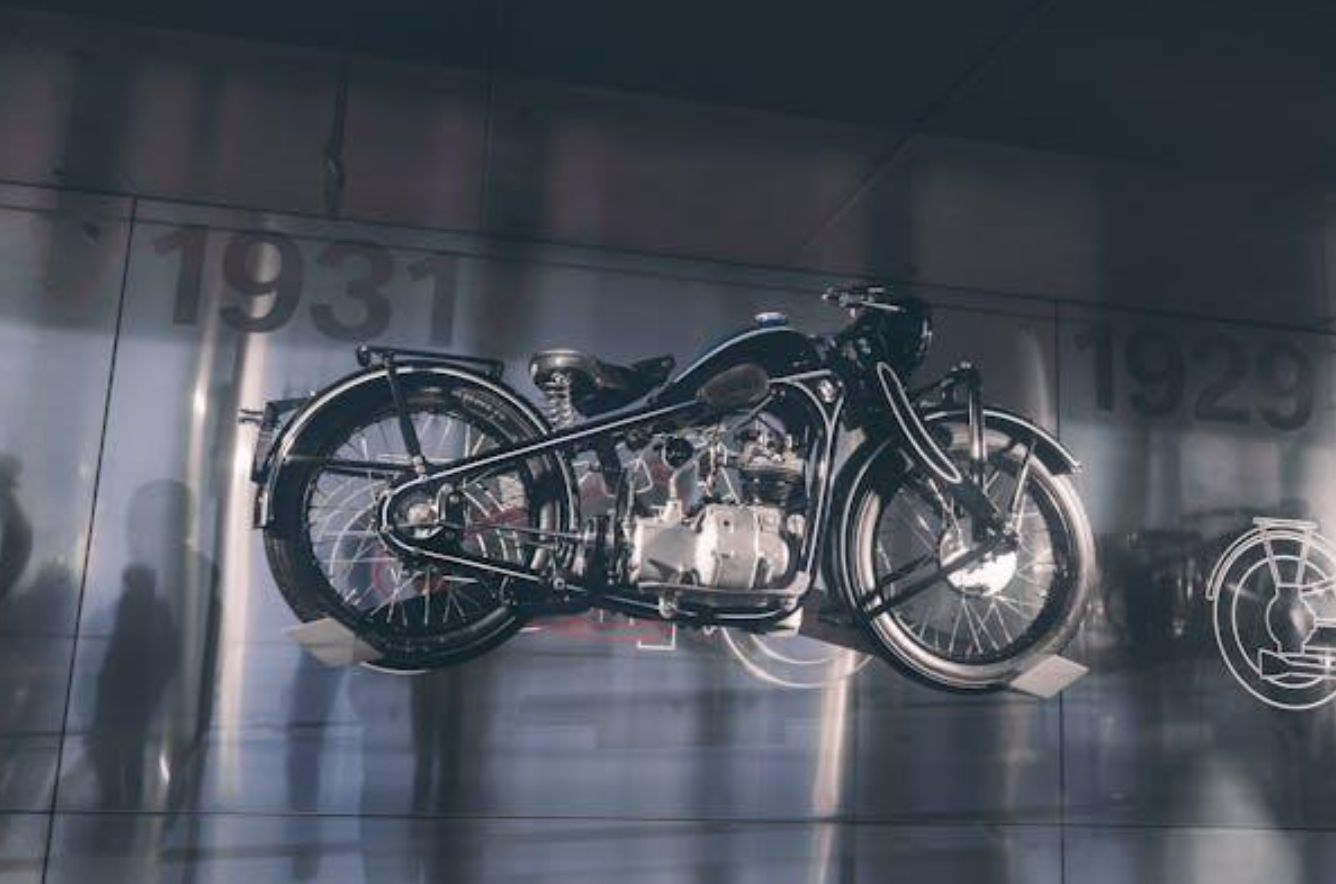 Black and grey scale model of motorcycle; image by Maria Geller, via Pexels.com.