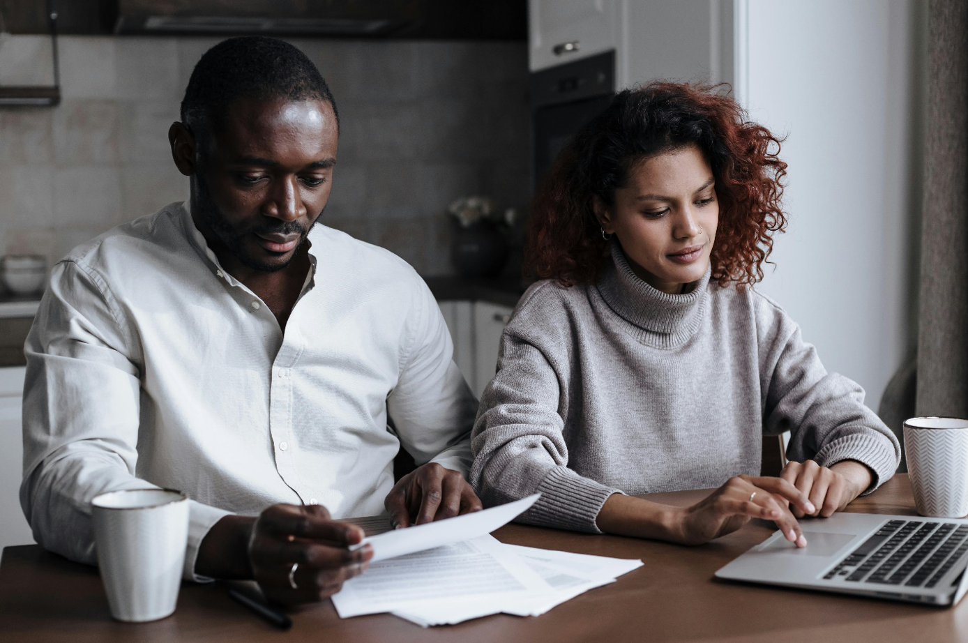 Couple sitting together; image by Ron Lach, via Pexels.com.