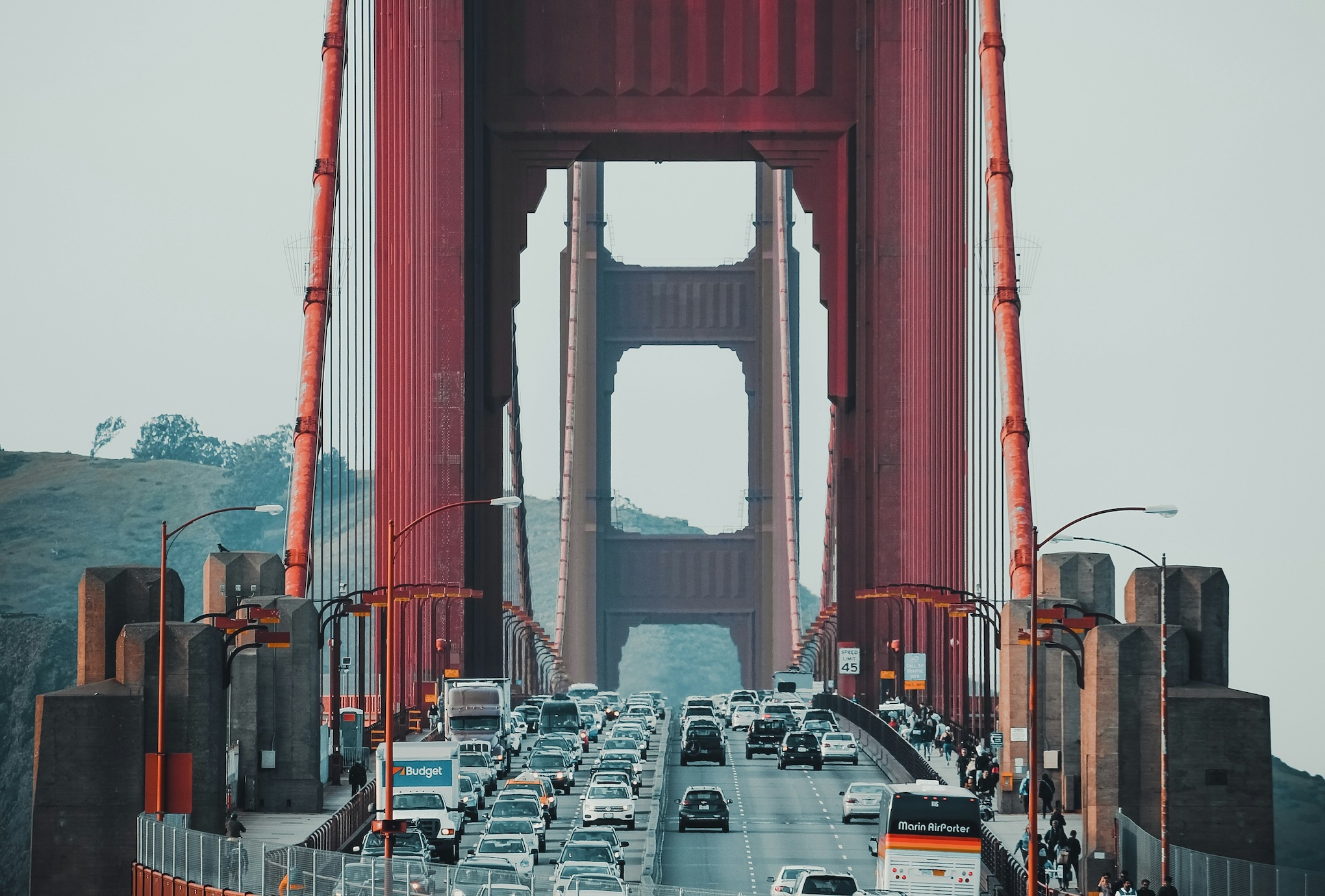 Golden Gate Bridge with traffic; image by Saketh, via Unsplash.com.