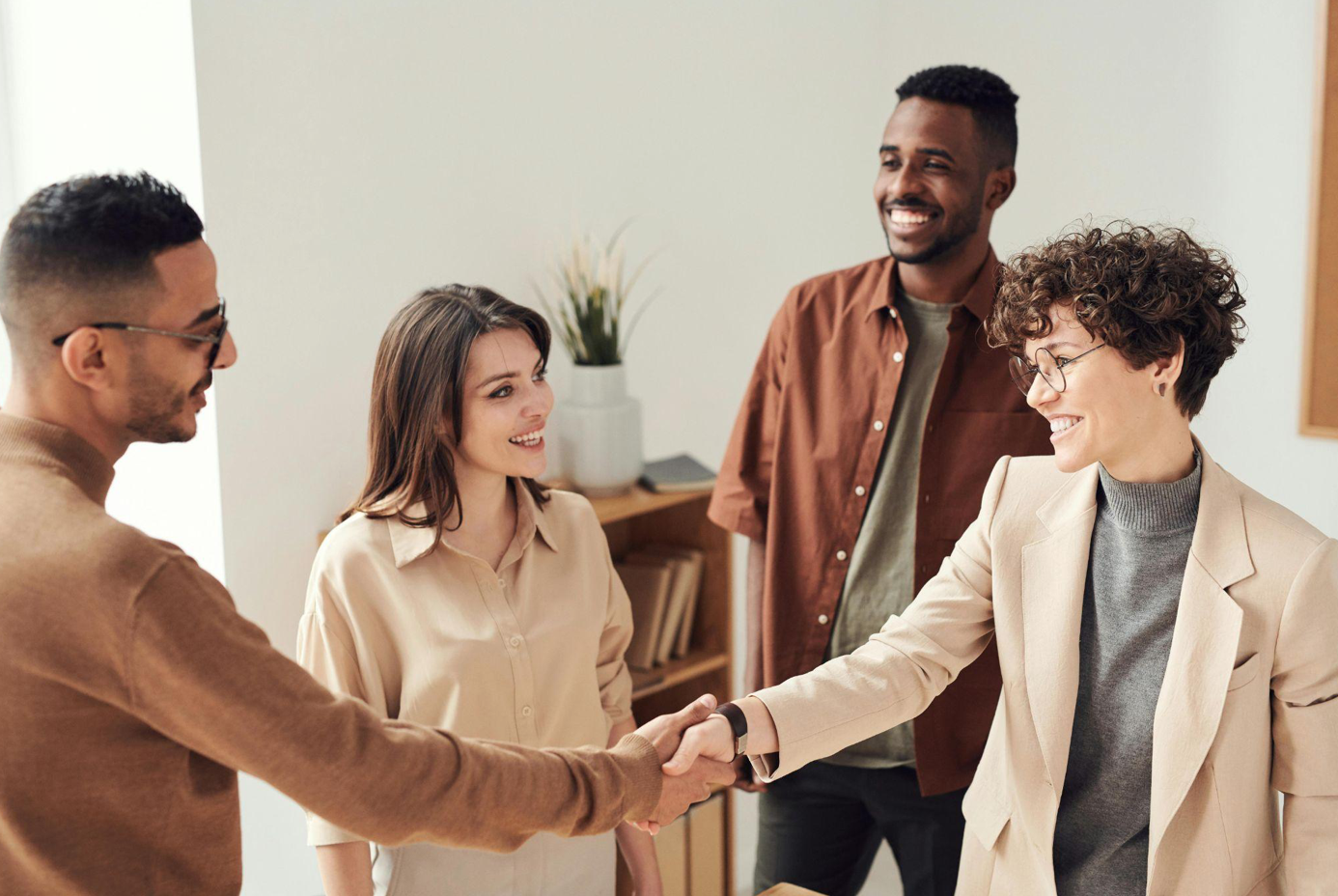 People shaking hands; image by fauxels, via Pexels.com.