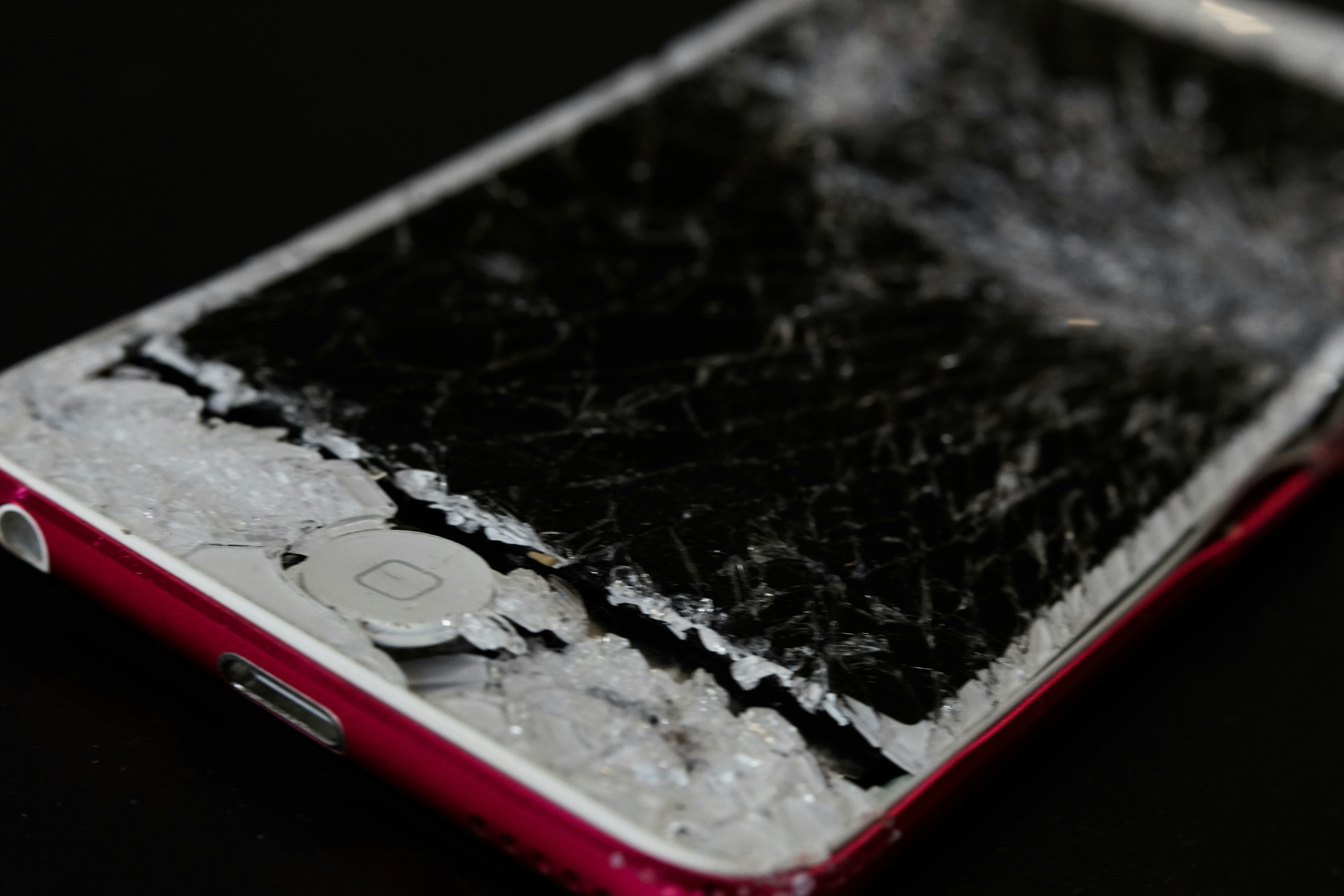 Phone with broken screen; image by Laura Rivera, via Unsplash.com.