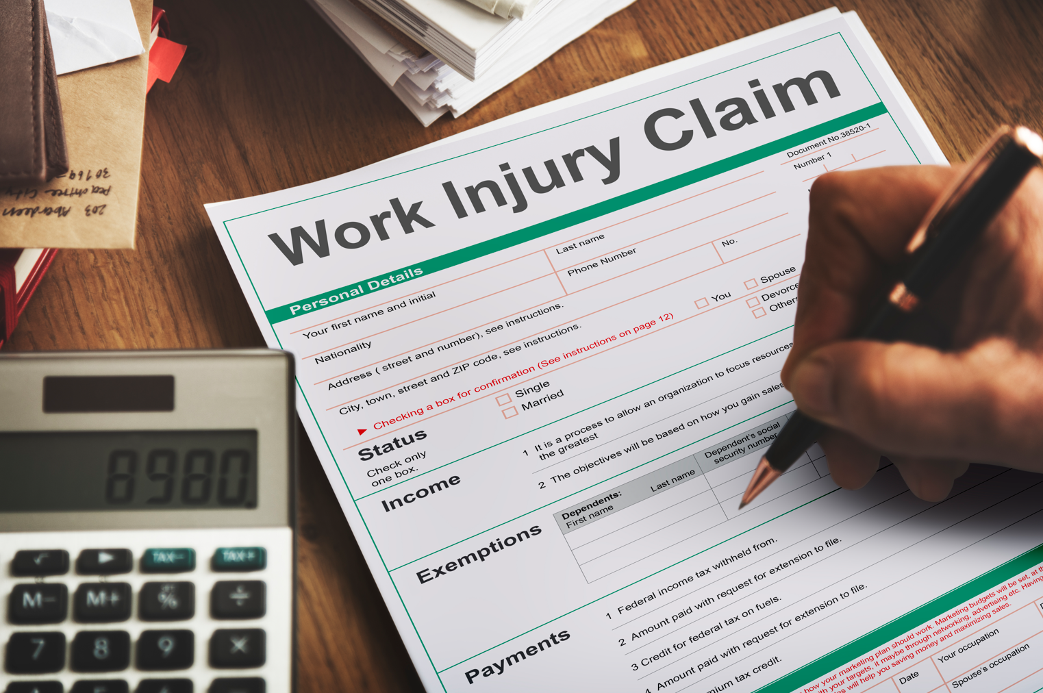 Work injury compensation claim form; image by rawpixel.com, via Freepik.com.